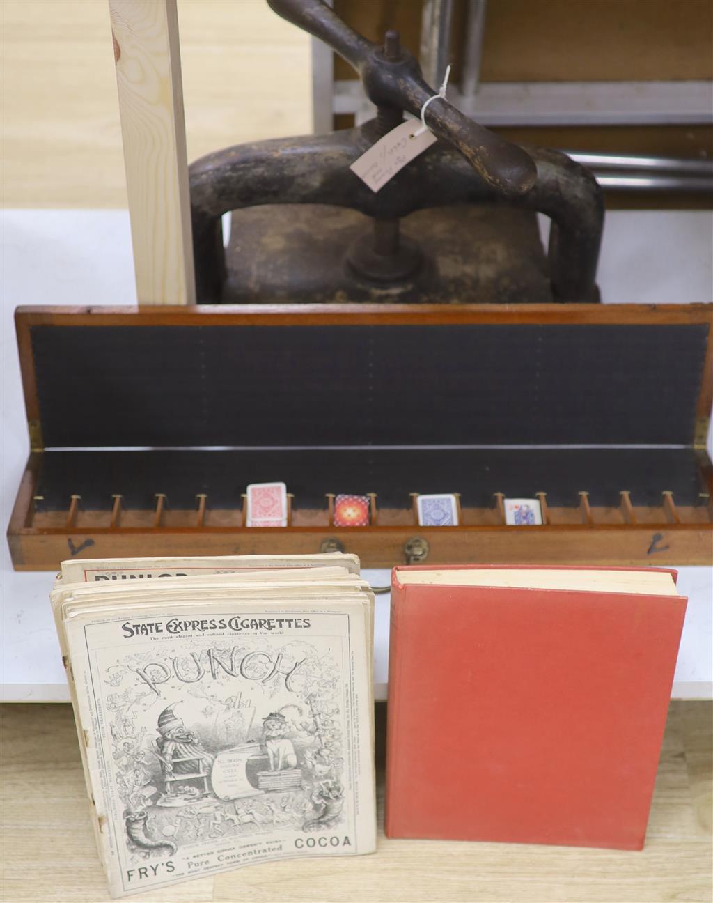 A book binders cast iron press, various Punch publications, a Jacques mahogany patience box